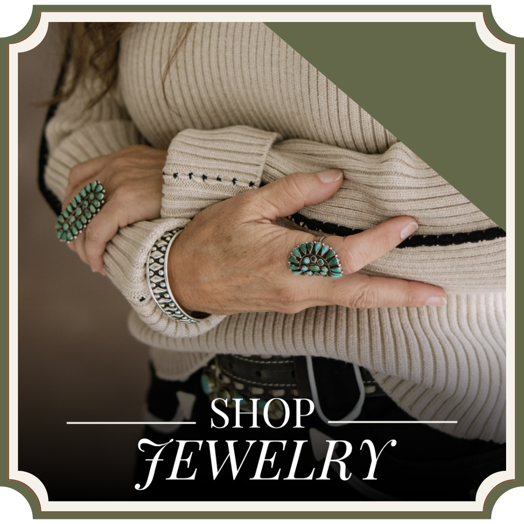 Person wearing turquoise rings on a beige sweater with 'Shop Jewelry' text overlay. | Crooked Horn Company | San Tan Valley, AZ